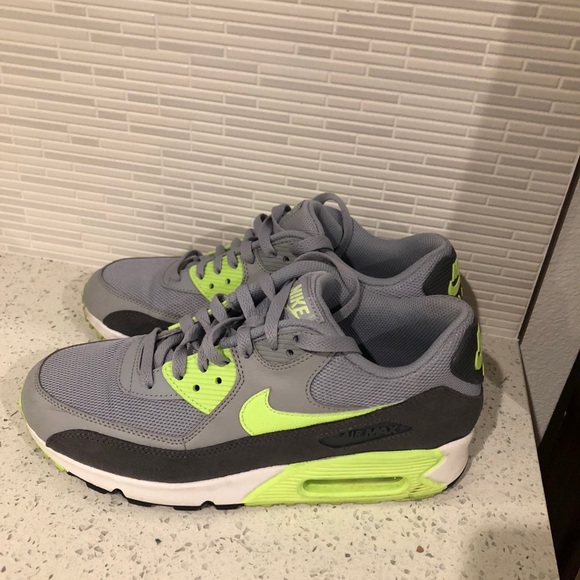 neon green and gray nike shoes